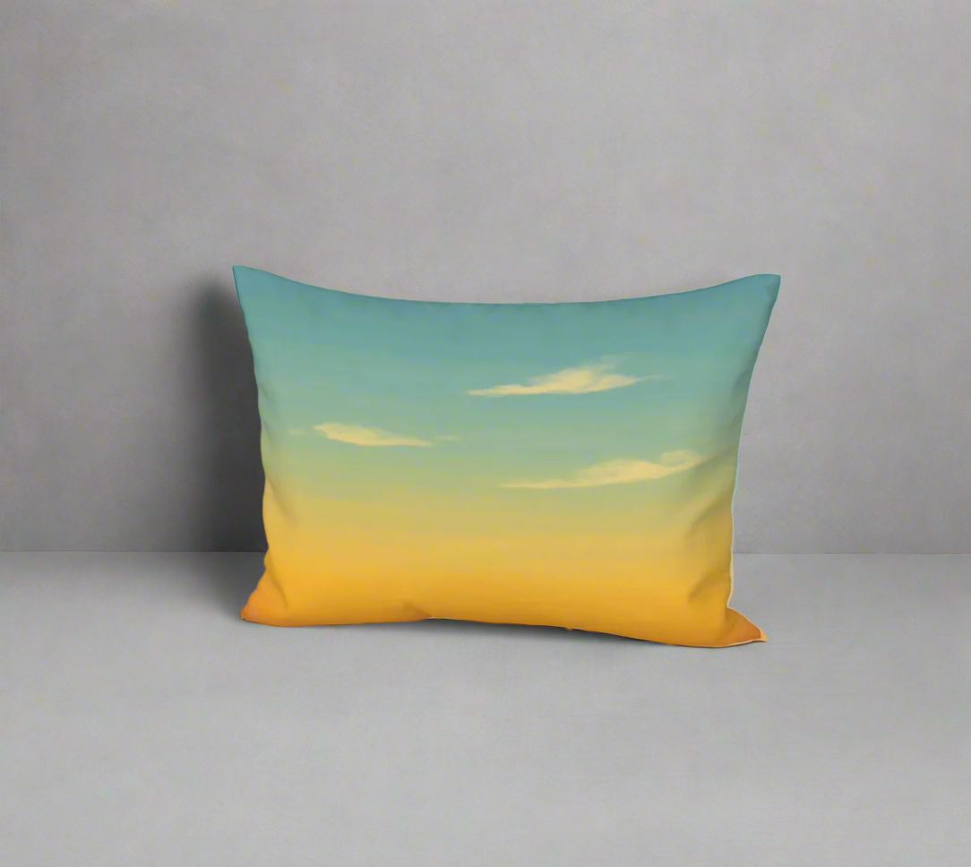 Decorative pillow with a gradient design from blue to yellow on a white background