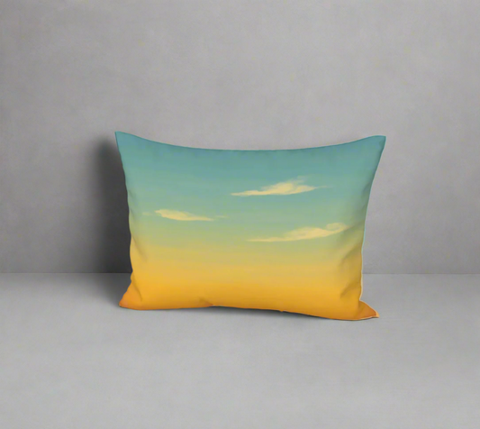Decorative pillow with a gradient design from blue to yellow on a white background